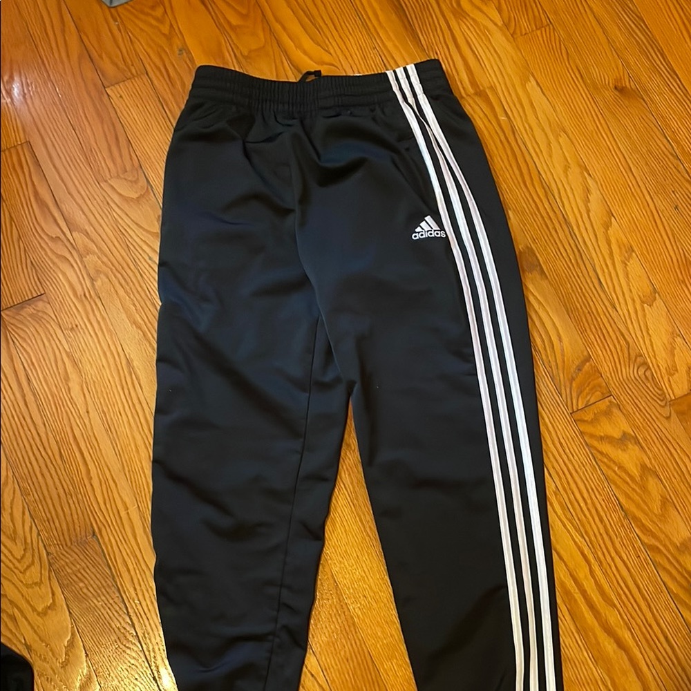 Adidas Black Track Pants with Iconic Stripes